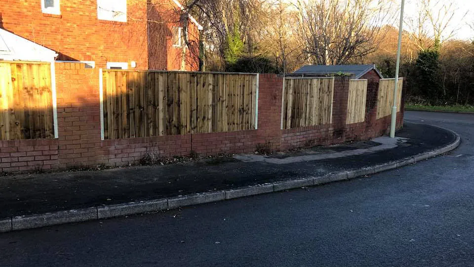A customers fence we erected that has close boards and fixed between walls. 