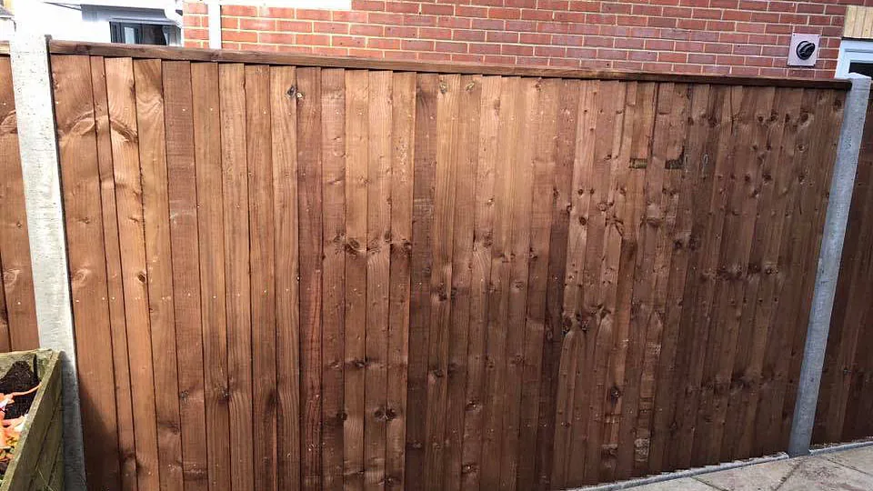 A customers fence we erected that has close boards with concrete posts and gravel boards. 