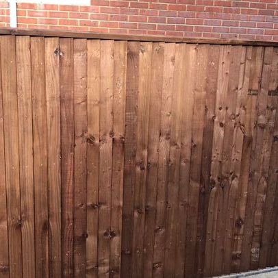 A customers fence we erected that has close boards with concrete posts and gravel boards. 