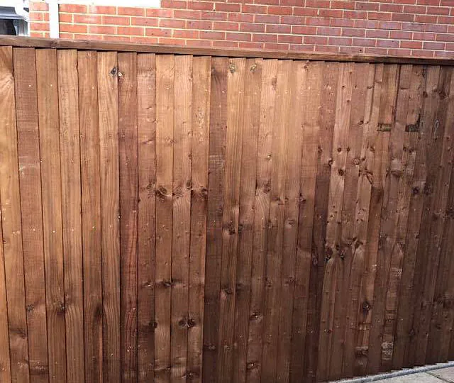 A customers fence we erected that has close boards with concrete posts and gravel boards. 