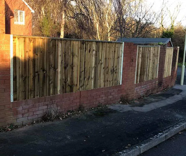 A customers fence we erected that has close boards and fixed between walls. 